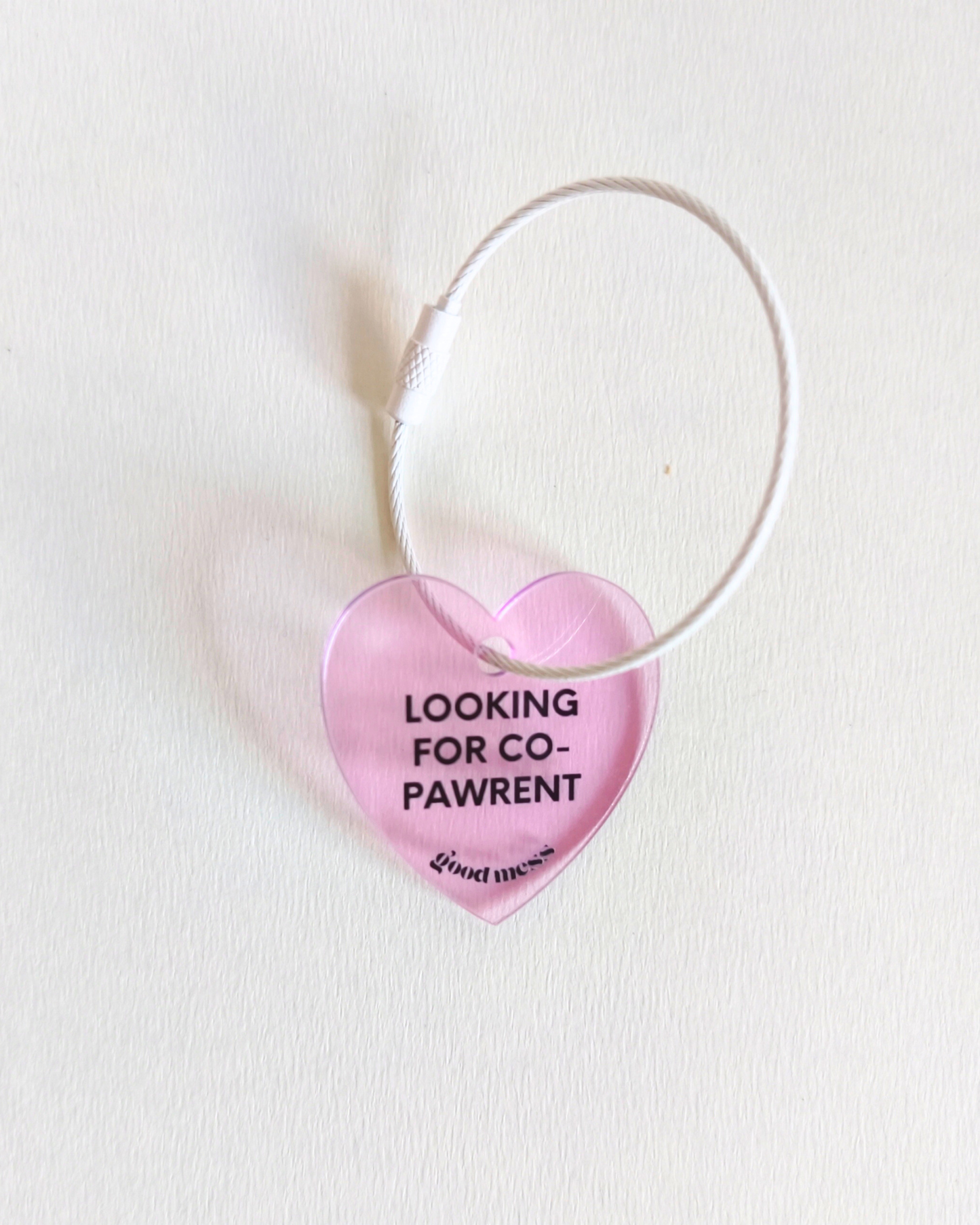 twinning pink heart shape acrylic matching bag charm with words "looking for co-pawrent'. for cats and dogs