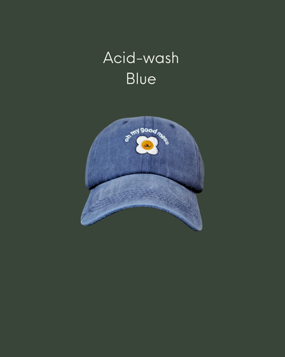  acid wash cap in blue with Good Mess motif logo
