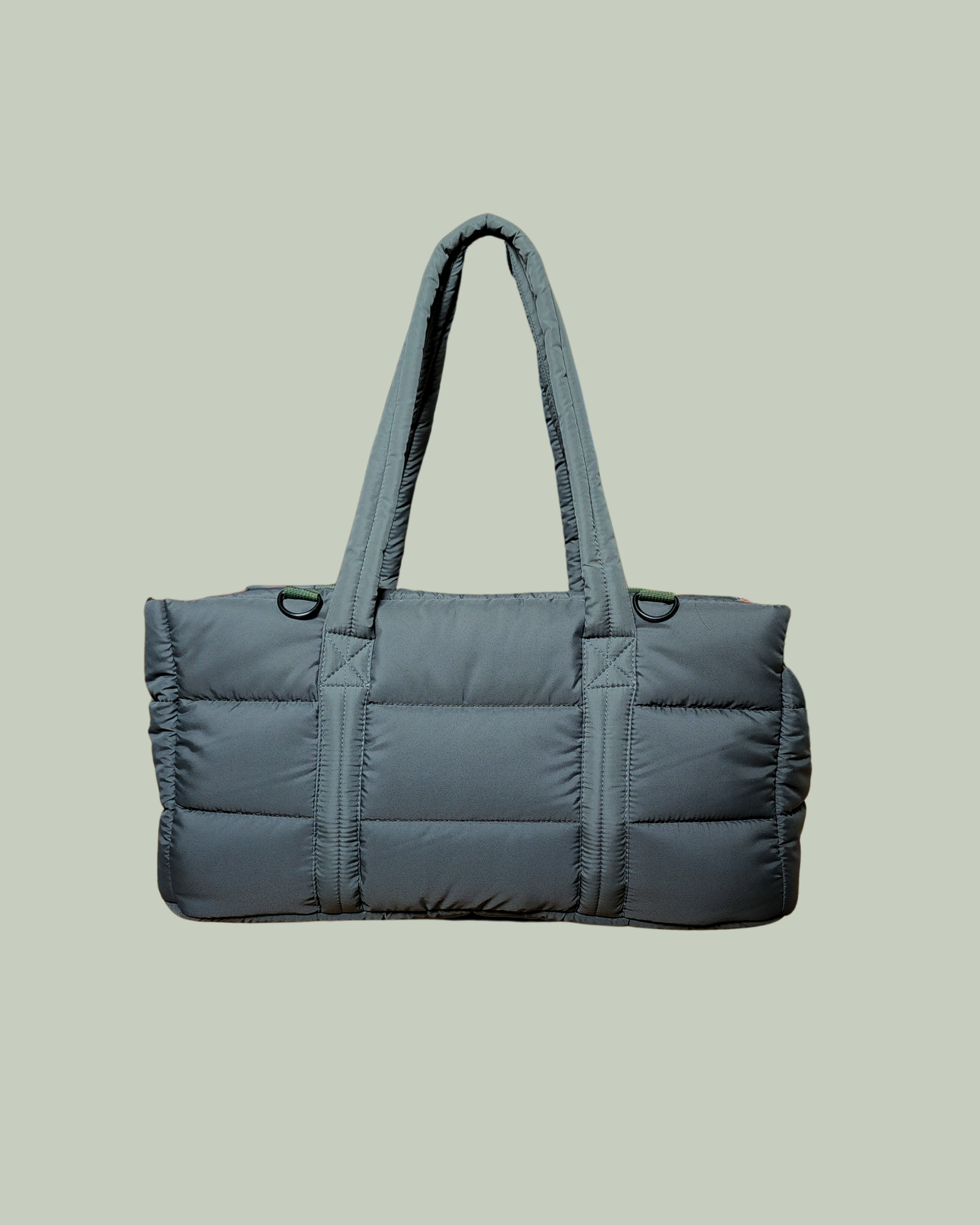The Everywhere pet puffer carrier in olive green. padded, aesthetic, lightweight, sturdy, washable and comfortable.