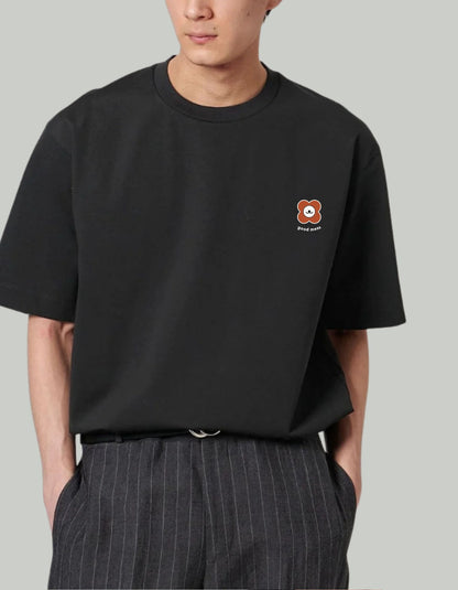 Person wearing a black tee shirt with text 'Friendly Dog Anti-Social Person' on the back. 100% cotton 210gsm.