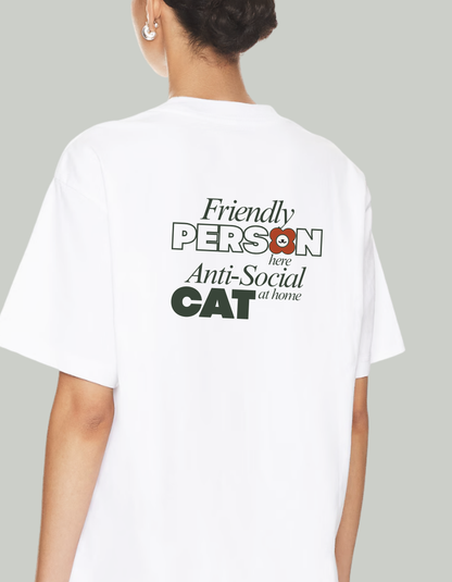 Person wearing a white tee shirt with text 'Friendly person Anti-Social cat' on the back. 100% cotton 210gsm.
