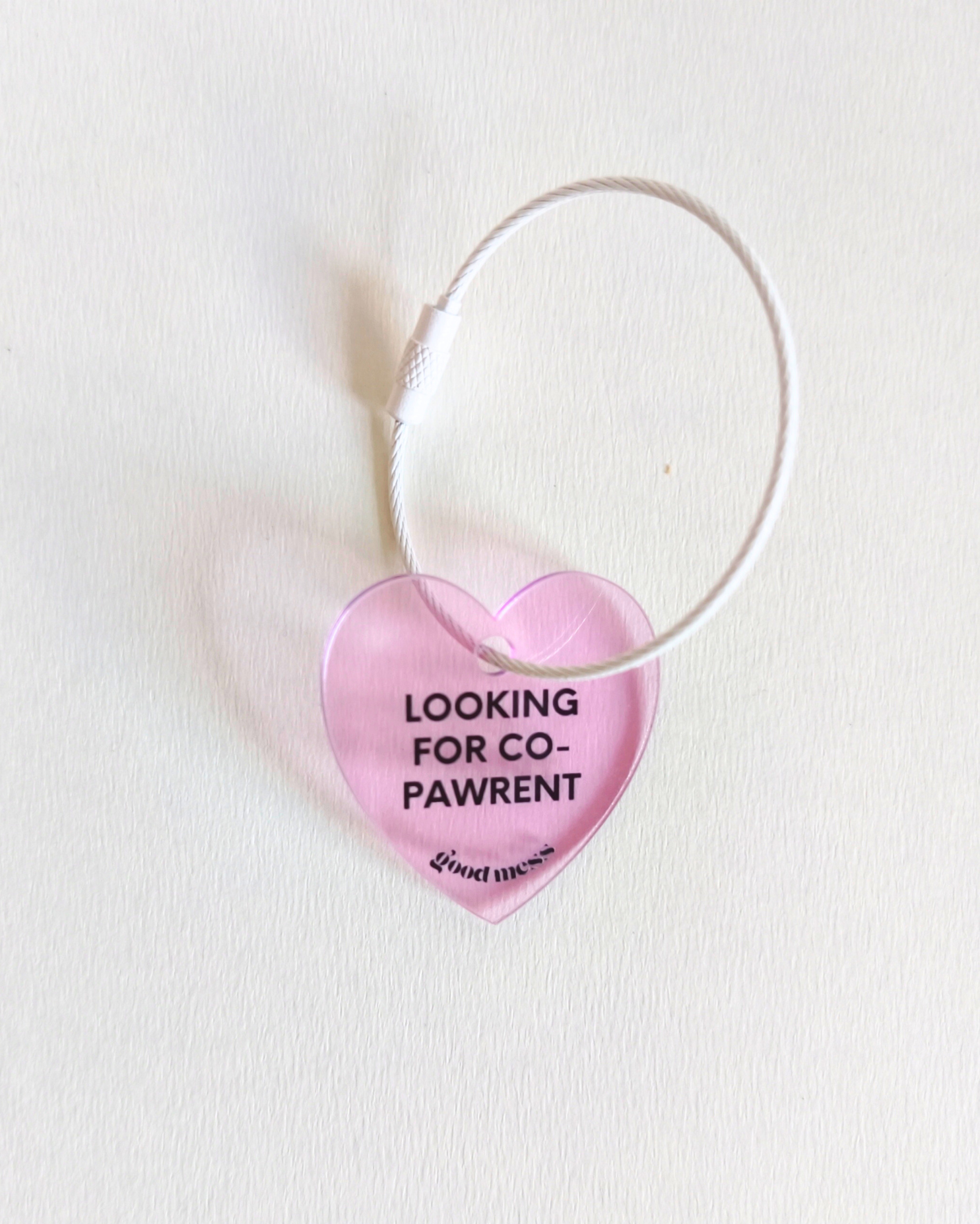 twinning pink heart shape acrylic matching bag charm with words "looking for co-pawrent'. for cats and dogs 