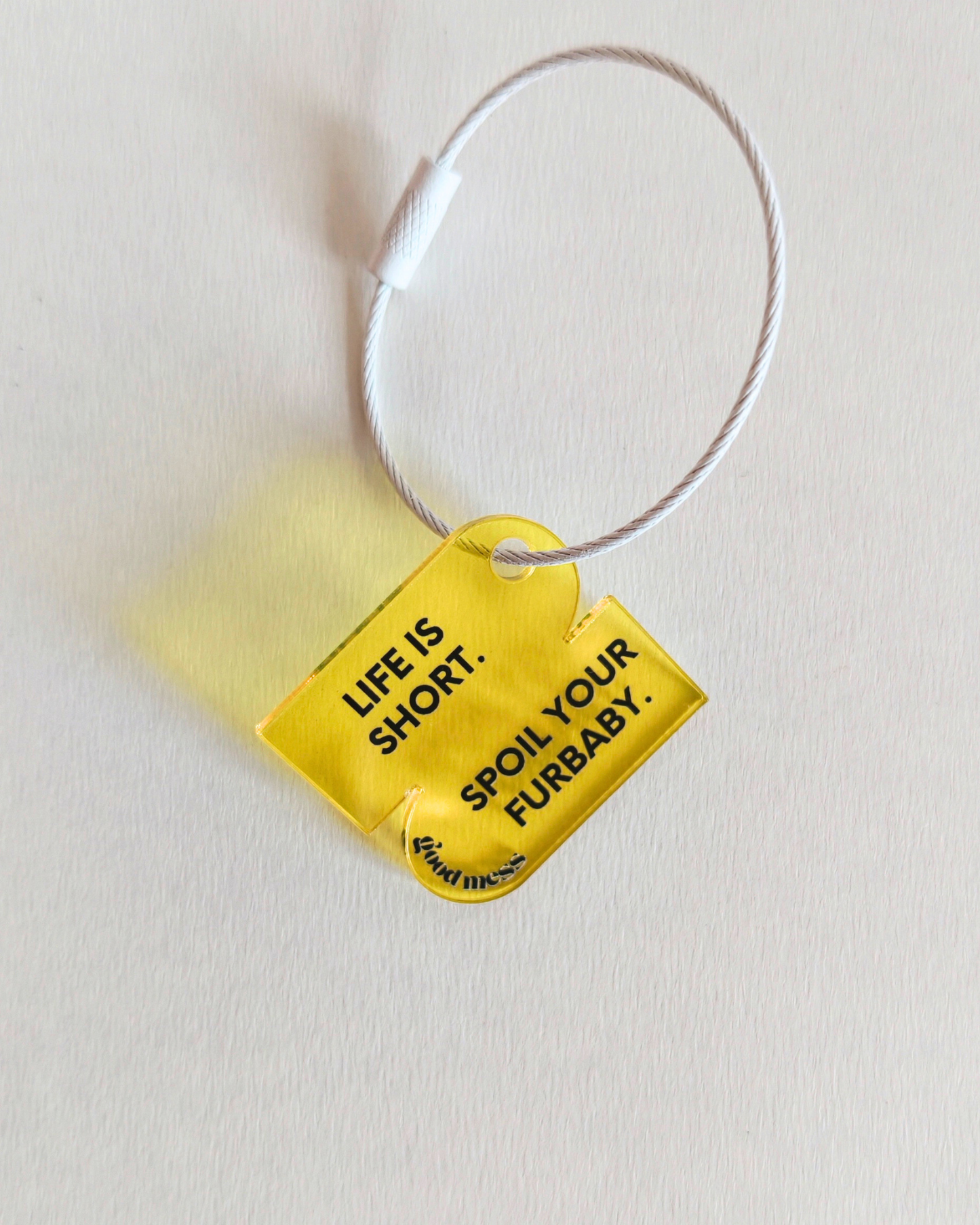yellow acrylic bag charm "Life is short. Spoil your furbaby" with matching pet collar charm twinning witty quotes  "Spoilt rotten" and
